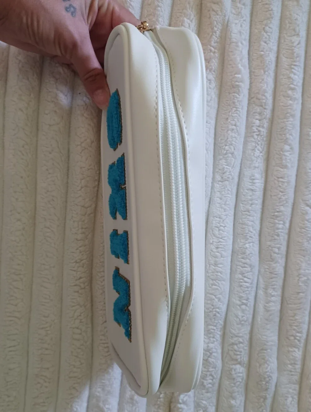 Neutrogena White Makeup Bag with Blue 'SKIN' Chenille Patch